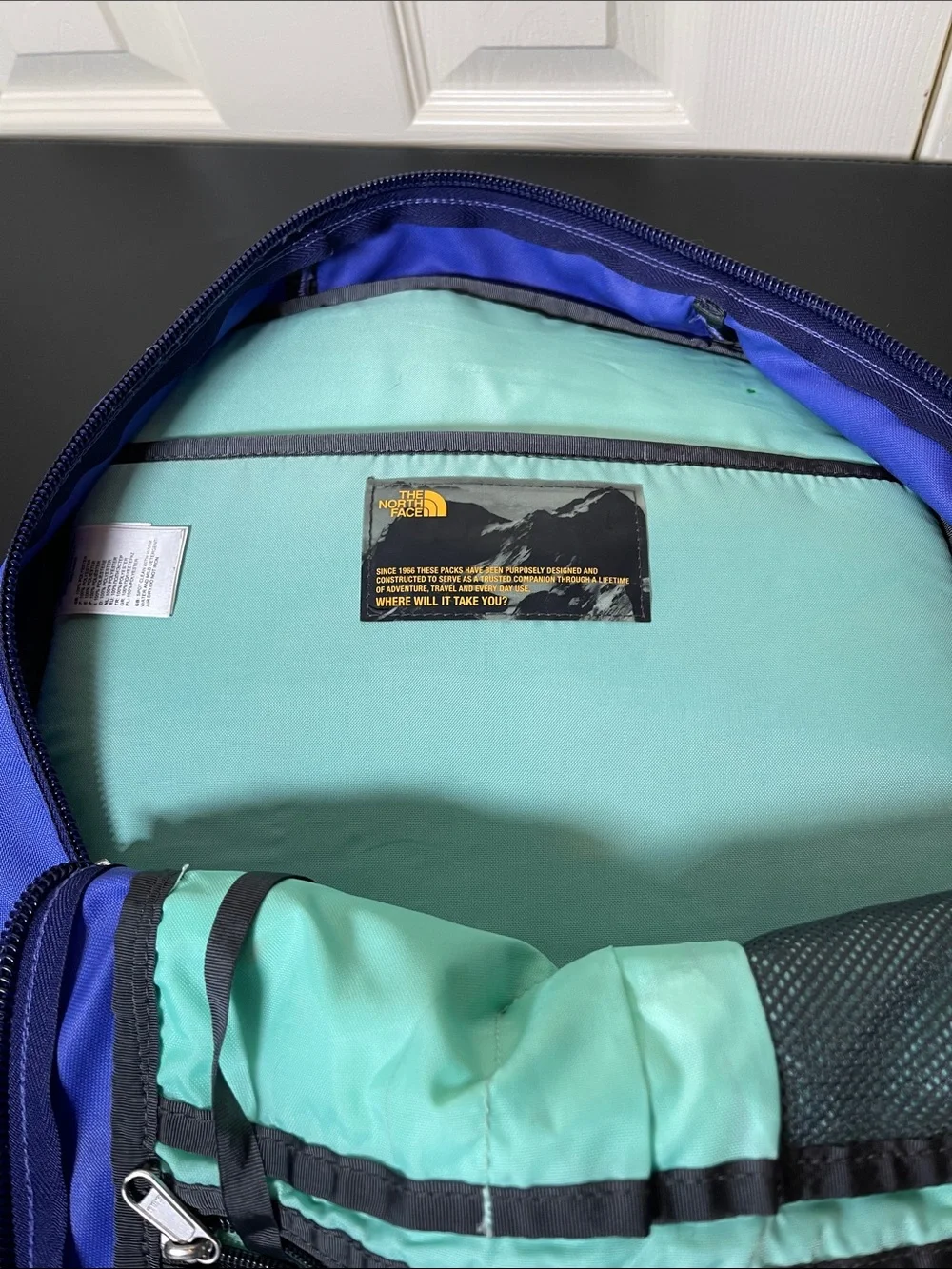 The North Face Blue and Navy Backpack with Mint Accents